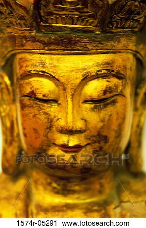 Close-up of a Buddha statue View Large Photo Image Stock Image - Close-up of a Buddha statue. Fotosearch