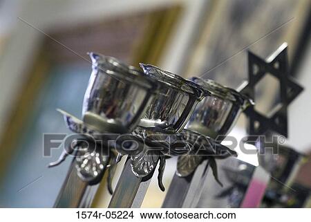Close-up of a candle stand and the Star of David View Large Photo Image Picture - Close-up of a candle stand and the Star of David. Fotosearch