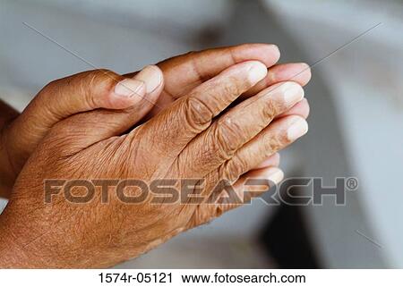 Close-up of a person's hands together View Large Photo Image Stock Image - Close-up of a person's hands together. Fotosearch