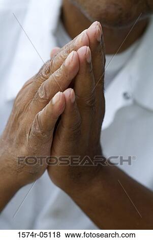Close-up of a person's hands together View Large Photo Image Stock Photo - Close-up of a person's hands together. Fotosearch