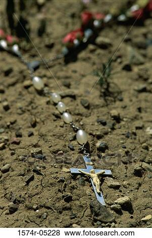 Close-up of a rosary on the floor View Large Photo Image Stock Photo - Close-up of a rosary on the floor. Fotosearch
