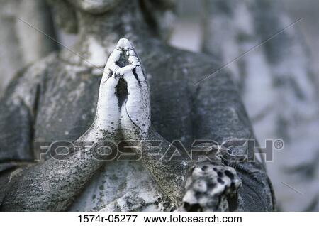 Stock Photo - Close-up of a statue of an angel. Fotosearch