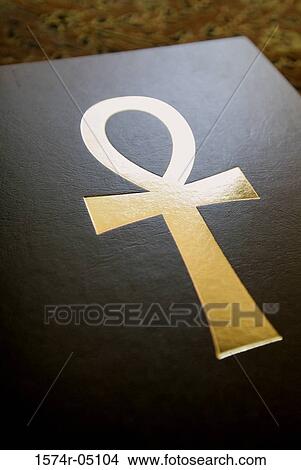 Close-up of ankh symbol on a book View Large Photo Image Picture - Close-up of ankh symbol on a book. Fotosearch
