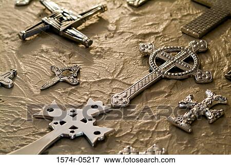Close-up of crosses mounted on a wall View Large Photo Image Stock Photo - Close-up of crosses mounted on a wall. Fotosearch