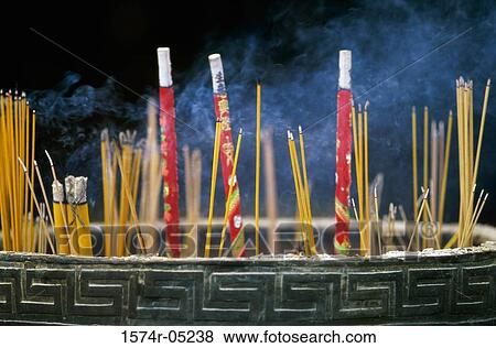 Close-up of incense sticks burning, Man Mo Temple, Hong Kong, China View Large Photo Image Stock Photo - Close-up of incense sticks burning, Man Mo Temple, Hong Kong, China. Fotosearch
