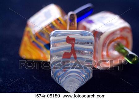 Close up of Jewish dreidels View Large Photo Image Stock Image - Close up of Jewish dreidels. Fotosearch