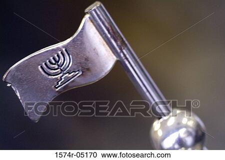 Close-up of metallic flag with a menorah View Large Photo Image Stock Image - Close-up of metallic flag with a menorah. Fotosearch