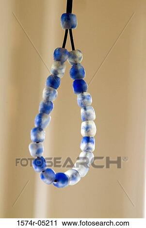 Close-up of prayer beads View Large Photo Image Stock Image - Close-up of prayer beads. Fotosearch