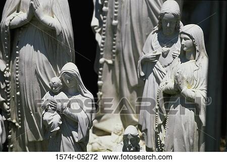 Close-up of religious statues View Large Photo Image Stock Image - Close-up of religious statues. Fotosearch