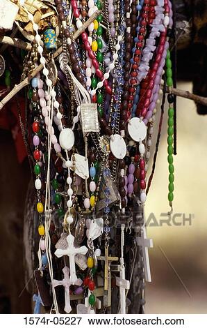 Close-up of rosaries hanging View Large Photo Image Stock Photo - Close-up of rosaries hanging. Fotosearch
