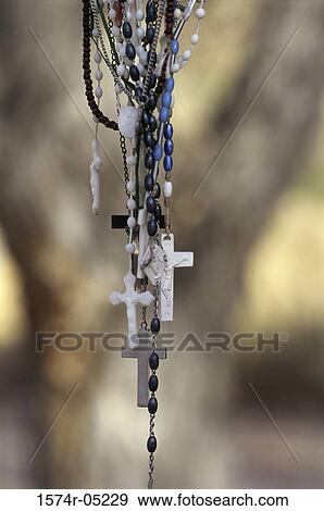 Close-up of rosaries hanging View Large Photo Image Stock Photo - Close-up of rosaries hanging. Fotosearch