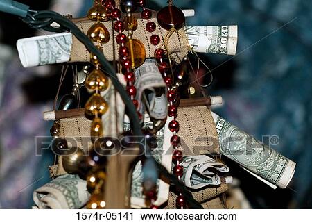 Close-up of Rosary beads and paper currency View Large Photo Image Stock Image - Close-up of Rosary beads and paper currency. Fotosearch