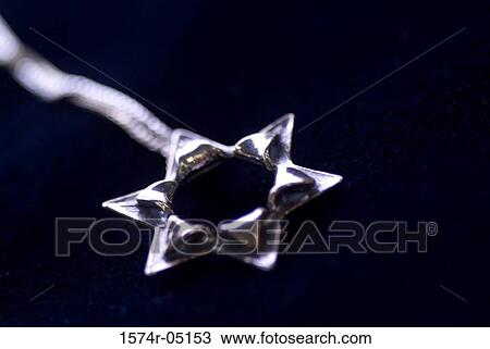 Close-up of the Star of David pendant View Large Photo Image Stock Image - Close-up of the Star of David pendant. Fotosearch
