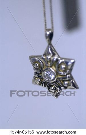 Close-up of the Star of David pendant View Large Photo Image Stock Photograph - Close-up of the Star of David pendant. Fotosearch