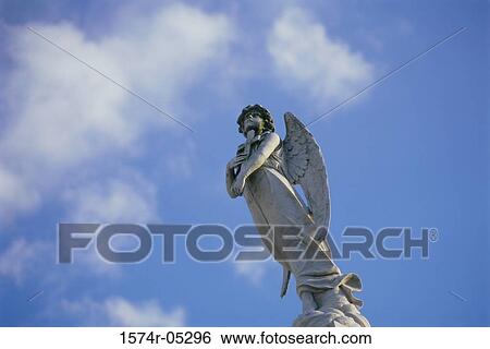 Low angle view of a statue of an angel, New Orleans, Louisiana, USA View Large Photo Image Stock Photograph - Low angle view of a statue of an angel, New Orleans, Louisiana, USA. Fotosearch