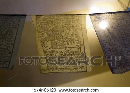 Stock Image - Low angle view of Buddhist prayer flags. Fotosearch