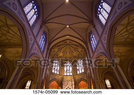 Low angle view of the interior of a church View Large Photo Image Stock Photo - Low angle view of the interior of a church. Fotosearch