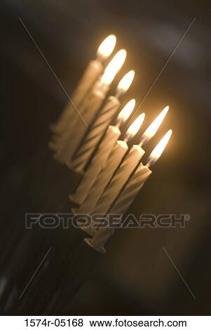 Menorah illuminated during Hanukkah festival View Large Photo Image Stock Photo - Menorah illuminated during Hanukkah festival. Fotosearch