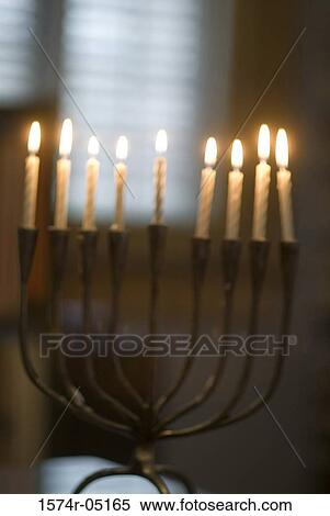 Menorah illuminated during Hanukkah festival View Large Photo Image Stock Photography - Menorah illuminated during Hanukkah festival. Fotosearch