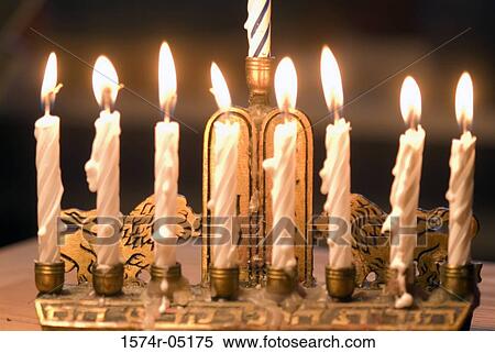 Menorah illuminated during Hanukkah festival View Large Photo Image Stock Photography - Menorah illuminated during Hanukkah festival. Fotosearch