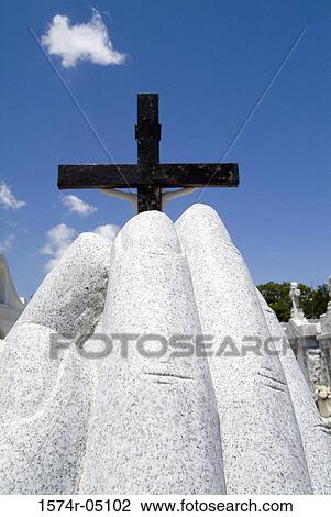 Rear view of a cross at St. Roch Cemetery, New Orleans, Louisiana, USA View Large Photo Image Stock Image - Rear view of a cross at St. Roch Cemetery, New Orleans, Louisiana, USA. Fotosearch