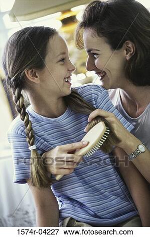 Close-up of a mother looking at her daughter View Large Photo Image Stock Photo - Close-up of a mother looking at her daughter. Fotosearch