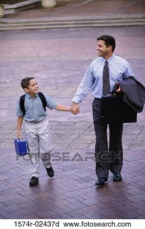 Father and his son holding hands View Large Photo Image Stock Image - Father and his son holding hands. Fotosearch