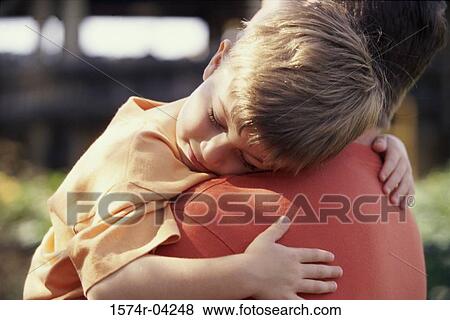 Father carrying his son View Large Photo Image Stock Photo - Father carrying his son. Fotosearch