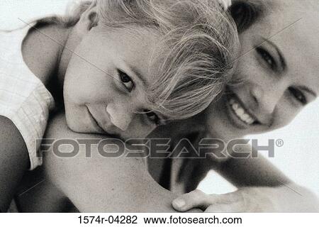 Stock Image - Portrait of a mother with her daughter. Fotosearch
