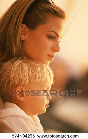 Stock Photography - Side profile of a mother with her son. Fotosearch