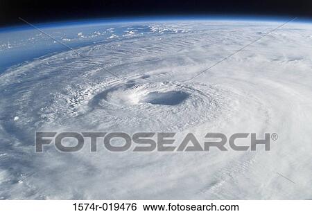 Stock Photograph - Satellite view of a hurricane in the ocean on Earth. Fotosearch