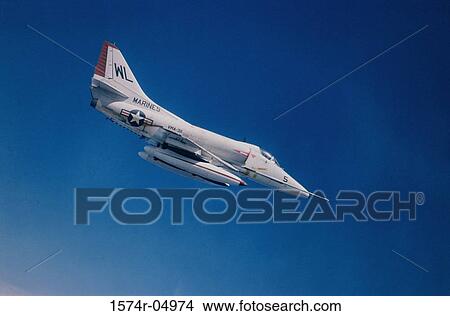 Picture - A-4 Skyhawk jet fighter in flight. Fotosearch