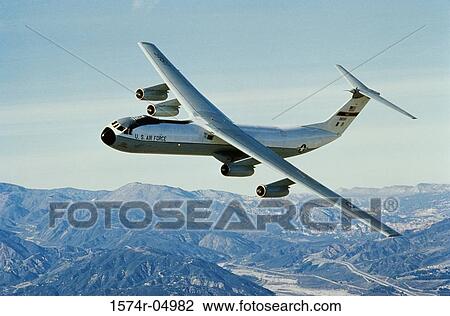 Aerial view of a C-141B Starlifter in flight View Large Photo Image Stock Image - Aerial view of a C-141B Starlifter in flight. Fotosearch