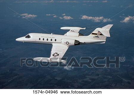 Aerial view of a C-21A aircraft in flight View Large Photo Image Stock Photograph - Aerial view of a C-21A aircraft in flight. Fotosearch