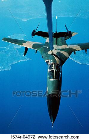 Aerial view of an F-111 refueled inflight by another aircraft View Large Photo Image Stock Image - Aerial view of an F-111 refueled inflight by another aircraft. Fotosearch