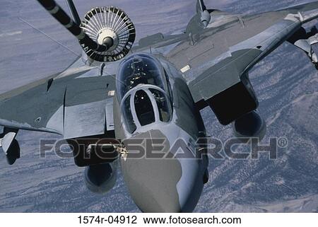Aerial view of an F-14A refueled inflight View Large Photo Image Stock Image - Aerial view of an F-14A refueled inflight. Fotosearch