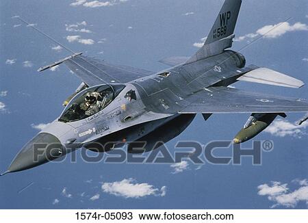 Aerial view of an F-16 Fighting Falcon in flight View Large Photo Image Stock Image - Aerial view of an F-16 Fighting Falcon in flight. Fotosearch