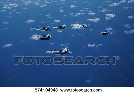 Aerial view of F-15 Eagle fighter planes flying in formation View Large Photo Image Stock Photo - Aerial view of F-15 Eagle fighter planes flying in formation. Fotosearch