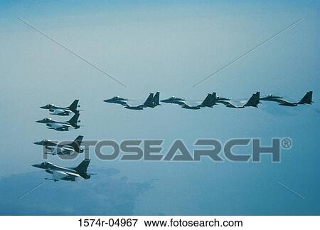 Aerial view of F-15 Eagle fighter planes flying in formation View Large Photo Image Stock Photo - Aerial view of F-15 Eagle fighter planes flying in formation. Fotosearch