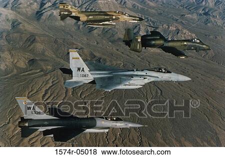 Aerial view of F-16 Fighting Falcons flying in formation View Large Photo Image Stock Photo - Aerial view of F-16 Fighting Falcons flying in formation. Fotosearch