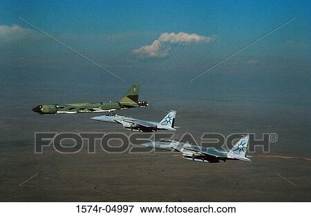 B-52 Stratofortress flying in formation with two F-15 Eagles View Large Photo Image Stock Photo - B-52 Stratofortress flying in formation with two F-15 Eagles. Fotosearch