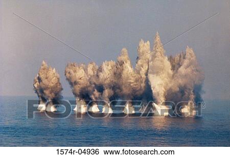 Stock Photograph - Explosions in the sea. Fotosearch