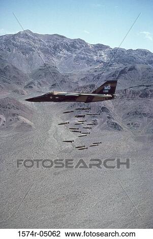 F-111 jet fighter dropping bombs View Large Photo Image Stock Image - F-111 jet fighter dropping bombs. Fotosearch