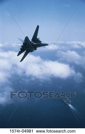 F-14A Tomcat fighter jet flying over USS John F. Kennedy View Large Photo Image Stock Image - F-14A Tomcat fighter jet flying over USS John F. Kennedy. Fotosearch