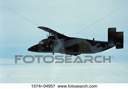 Low angle view of a C-23 Sherpa in flight View Large Photo Image Stock Photo - Low angle view of a C-23 Sherpa in flight. Fotosearch