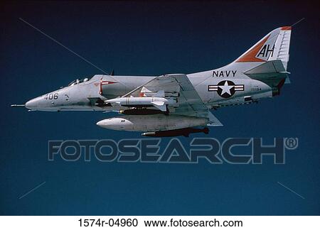 Low angle view of a fighter plane in flight View Large Photo Image Stock Image - Low angle view of a fighter plane in flight. Fotosearch