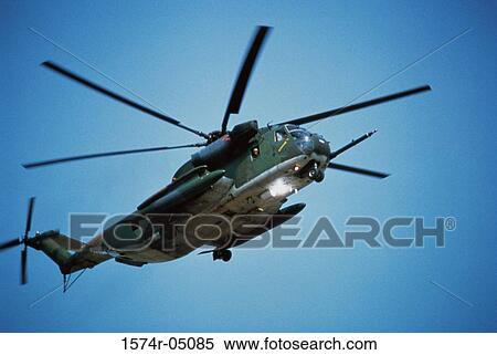 Low angle view of a MH-53H Pave Low military helicopter in flight View Large Photo Image Stock Photography - Low angle view of a MH-53H Pave Low military helicopter in flight. Fotosearch