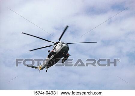 Low angle view of a Sikorsky SH-3 Sea King in flight View Large Photo Image Stock Image - Low angle view of a Sikorsky SH-3 Sea King in flight. Fotosearch