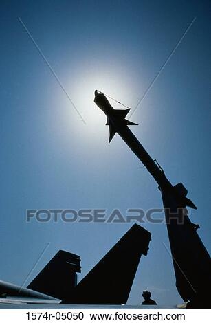 Low angle view of AIM-9 Sidewinder Missile of an F/A-18A Hornet Aircraft aboard the USS Dwight D. Eisenhower View Large Photo Image Stock Image - Low angle view of AIM-9 Sidewinder Missile of an F/A-18A Hornet Aircraft aboard the USS Dwight D. Eisenhower. Fotosearch