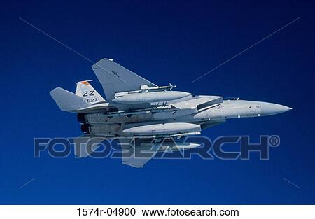 Low angle view of an F-15 Eagle in flight View Large Photo Image Stock Image - Low angle view of an F-15 Eagle in flight. Fotosearch